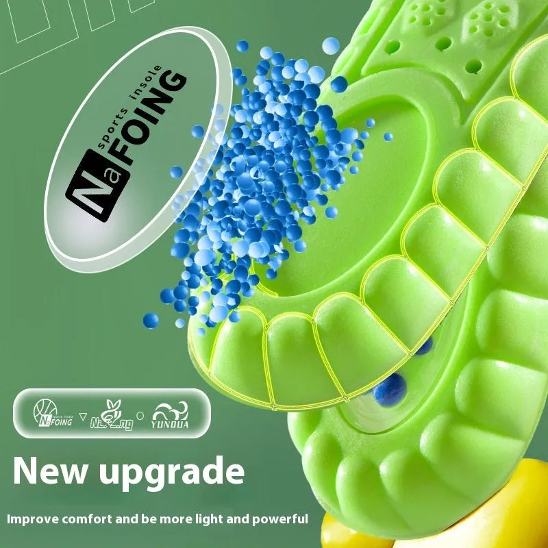 Green PU sports insoles with air cushion shock absorption and argy wormwood infusion on a white background.
