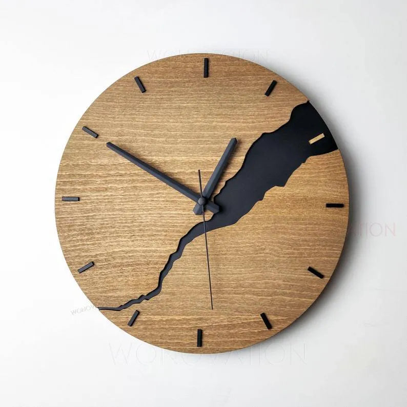Modern simple wooden wall clock with clean face in contemporary home setting