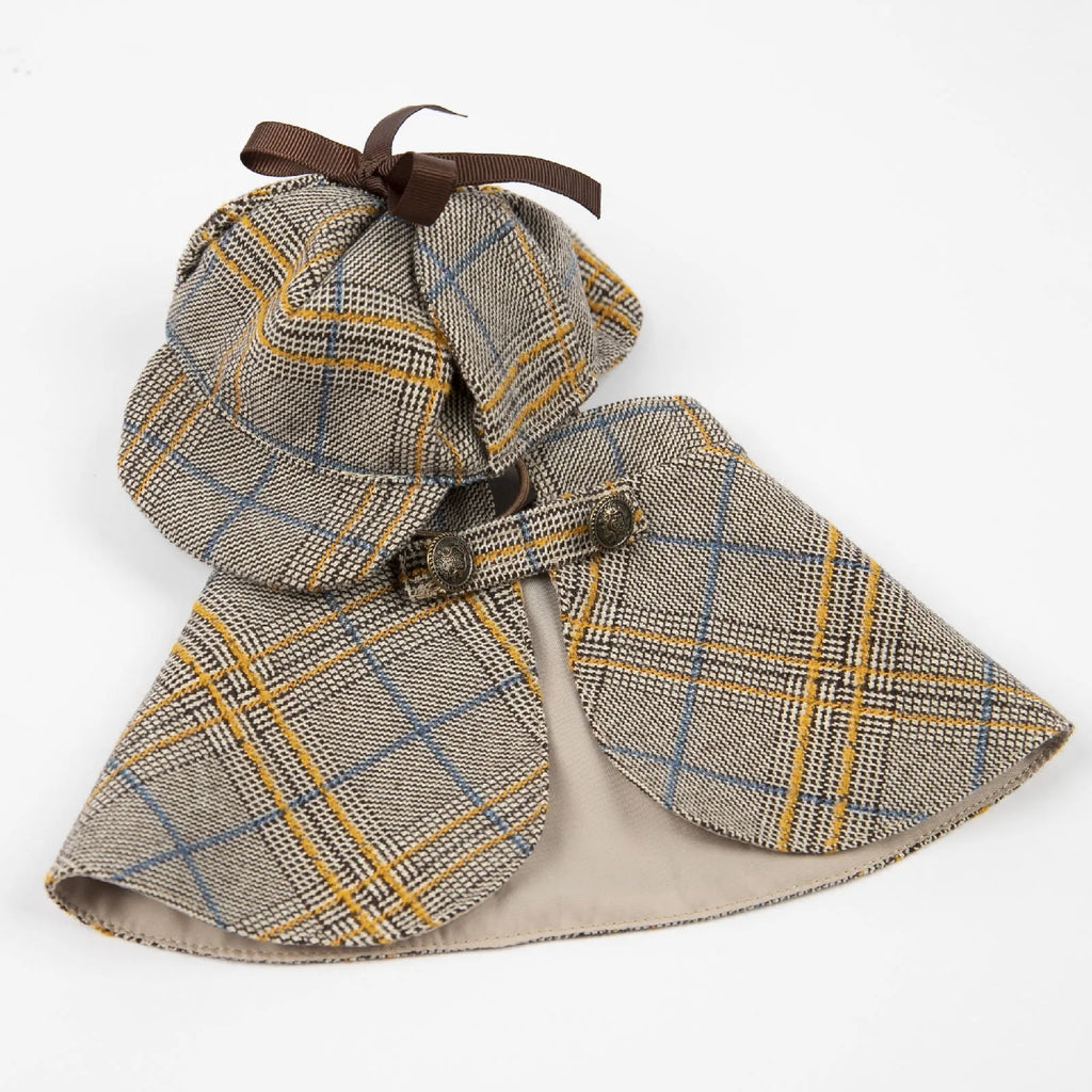 Camel coloured personalised cotton cloak for a dog with an adjustable hood.
