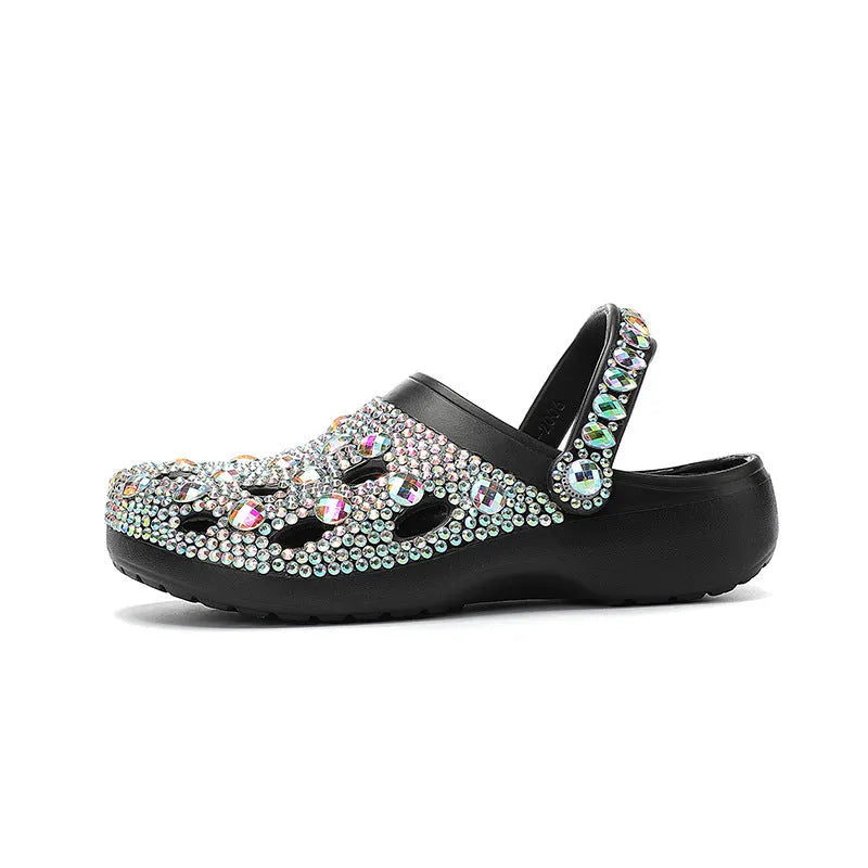 Black women's platform sandals with rhinestone decoration and hole shoes design on an EVA sole.