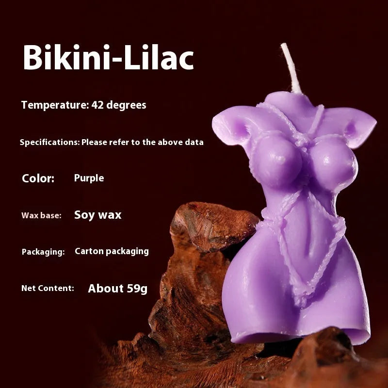 Low temperature soy wax candle in bikini shape, colour options: red, pink, purple.