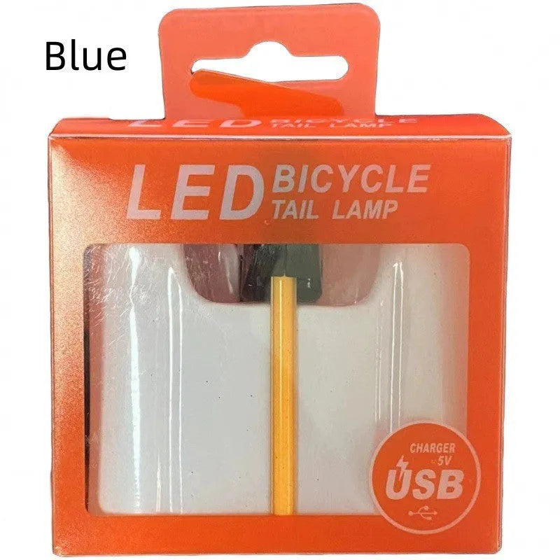 Waterproof USB charging bicycle and motorcycle taillight in blue, pink, red, white, or yellow colour options