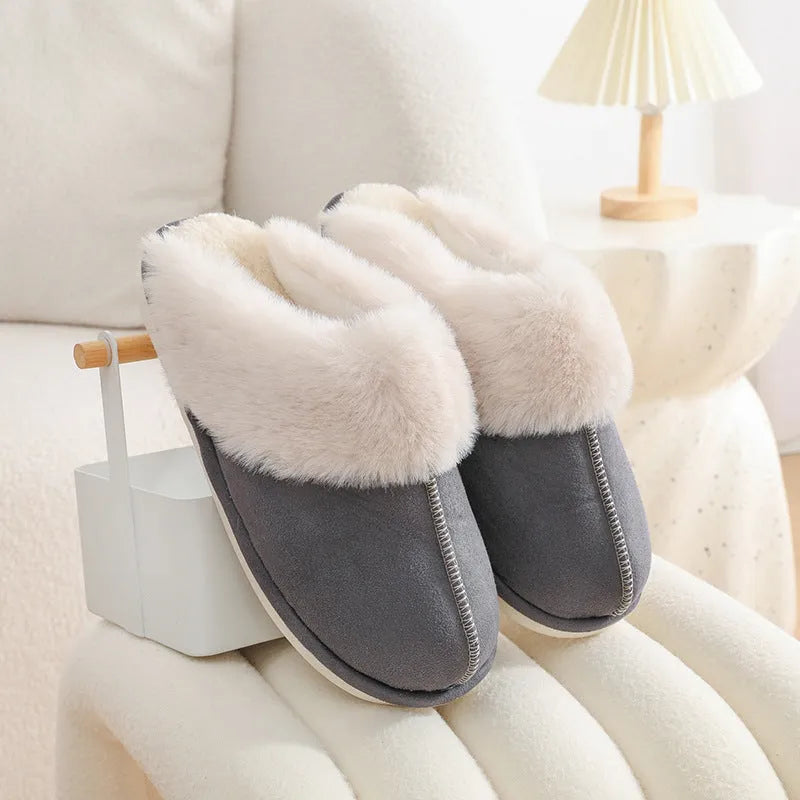 Women's brown plush indoor slippers with artificial wool lining and a textured PVC sole.