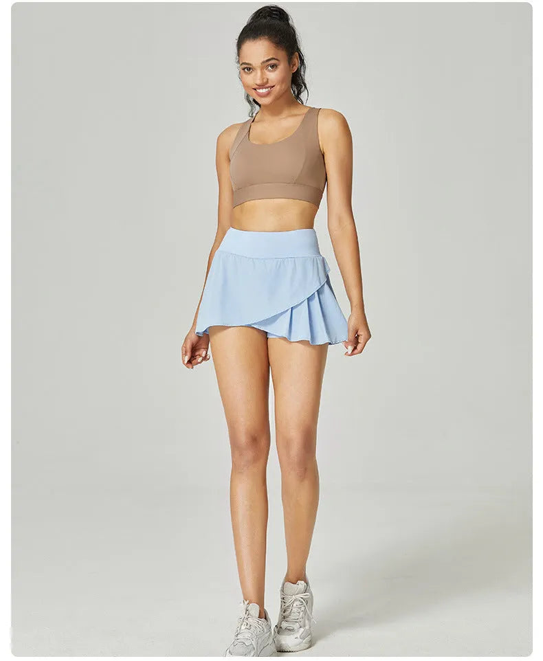 Women's solid colour quick-drying sports shorts in Klein blue, shown as waist-length and sleeveless for summer fitness.