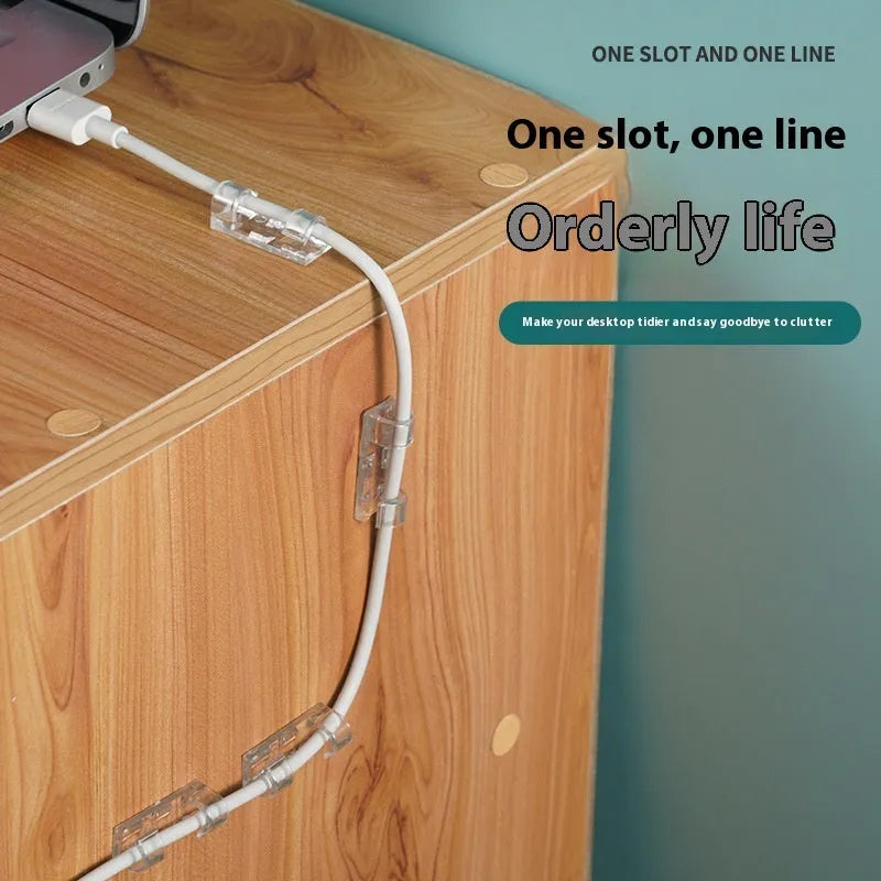Transparent plastic self-adhesive wire routing clips for cable organisation