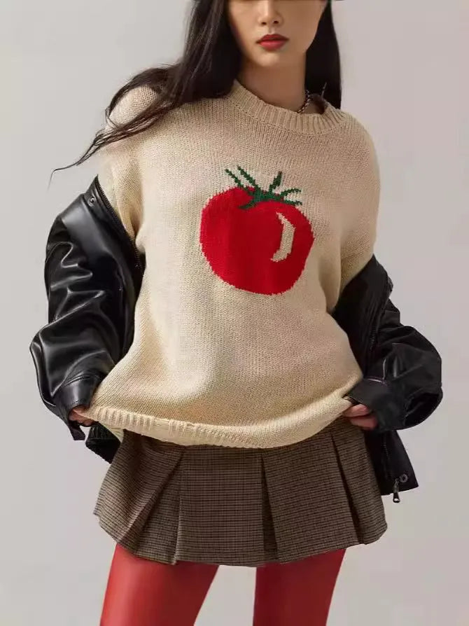 Beige women's loose-fitting acrylic jacquard pullover sweater with round neck and long sleeves.