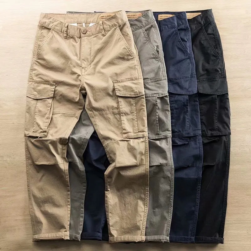 Men's solid colour cotton multi-pocket labour protection trousers in a cropped length.