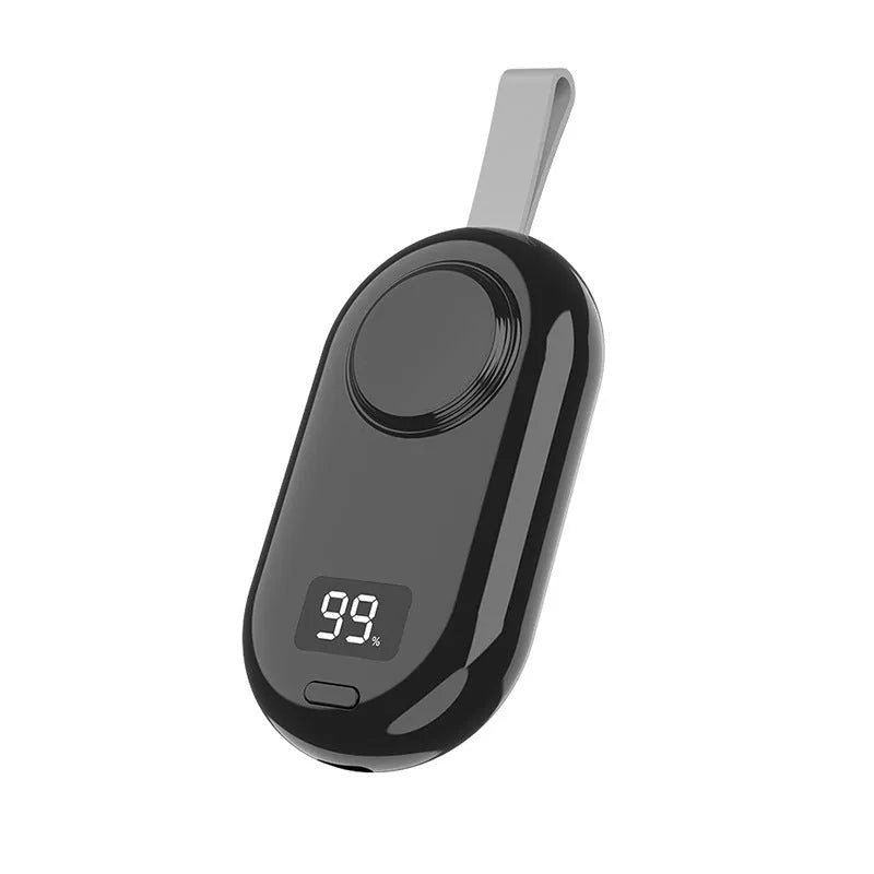 Black or white plastic wireless power bank for V5 smartwatches next to USB-C cable
