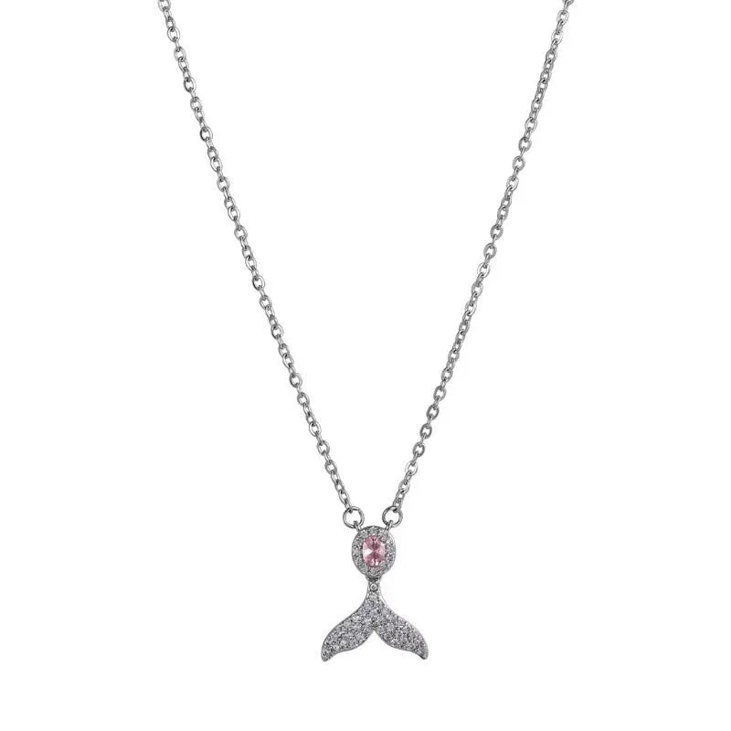 Close-up of a women's sterling silver geometric fishtail pendant necklace on an O-ring chain.