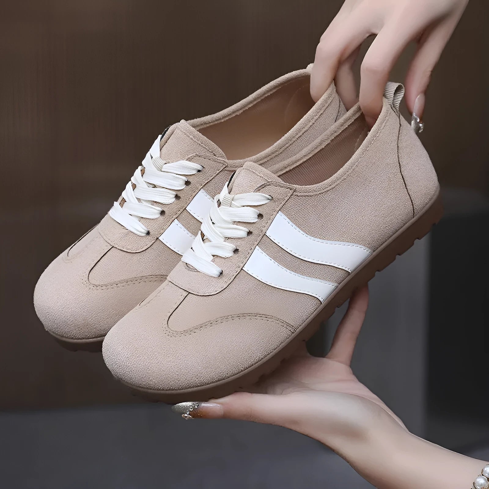 Women's vintage-style canvas sneakers with round toe and flat rubber sole in dark red.