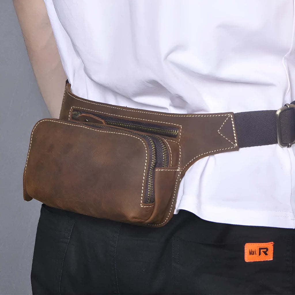 Brown cowhide leather men's sports waist bag with mobile phone compartment showing pull closure
