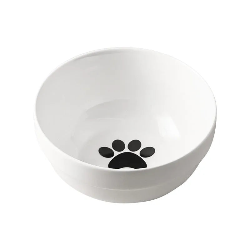 White ceramic pet bowl with decorative pattern in iron frame with cat ear accents
