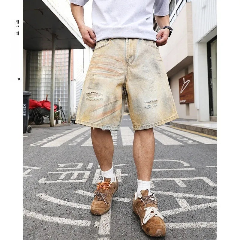 Light blue men's denim shorts with distressed wash and straight-leg silhouette