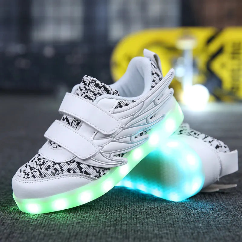 Children's plum red LED light-up sneakers with USB charging port and colourful luminous soles.
