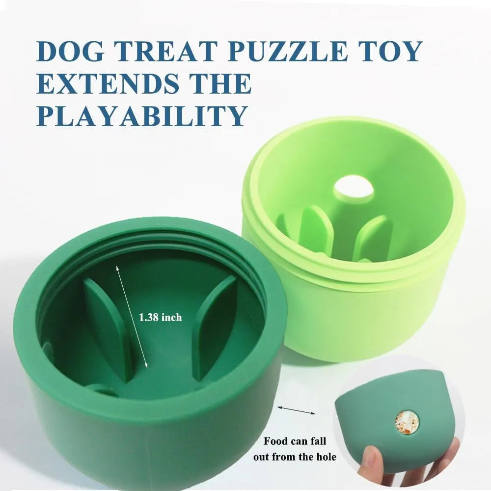 Two-tone silicone dog treat dispensing puzzle ball for small medium dogs on a wooden floor