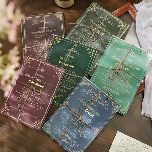Retro literary notebook with classical letters design showing six colour variations