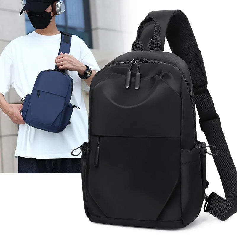Men's grey lightweight messenger chest bag showing front view and open large main compartment