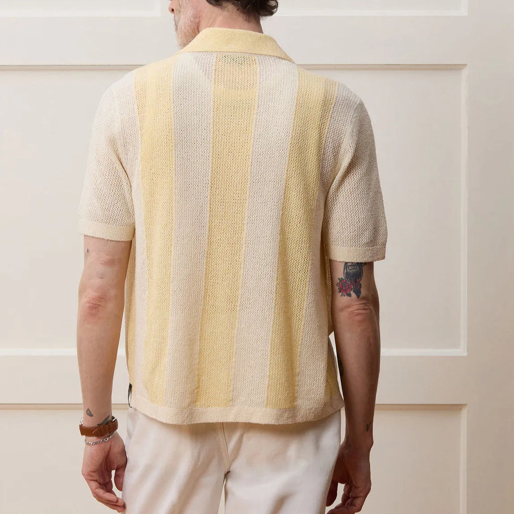 Yellow casual polo shirt with hollow-out pattern and asymmetric design, short sleeves
