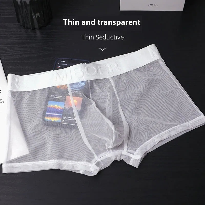 Men's thin invisible breathable boxer shorts in black colour showing knit polyester fabric texture