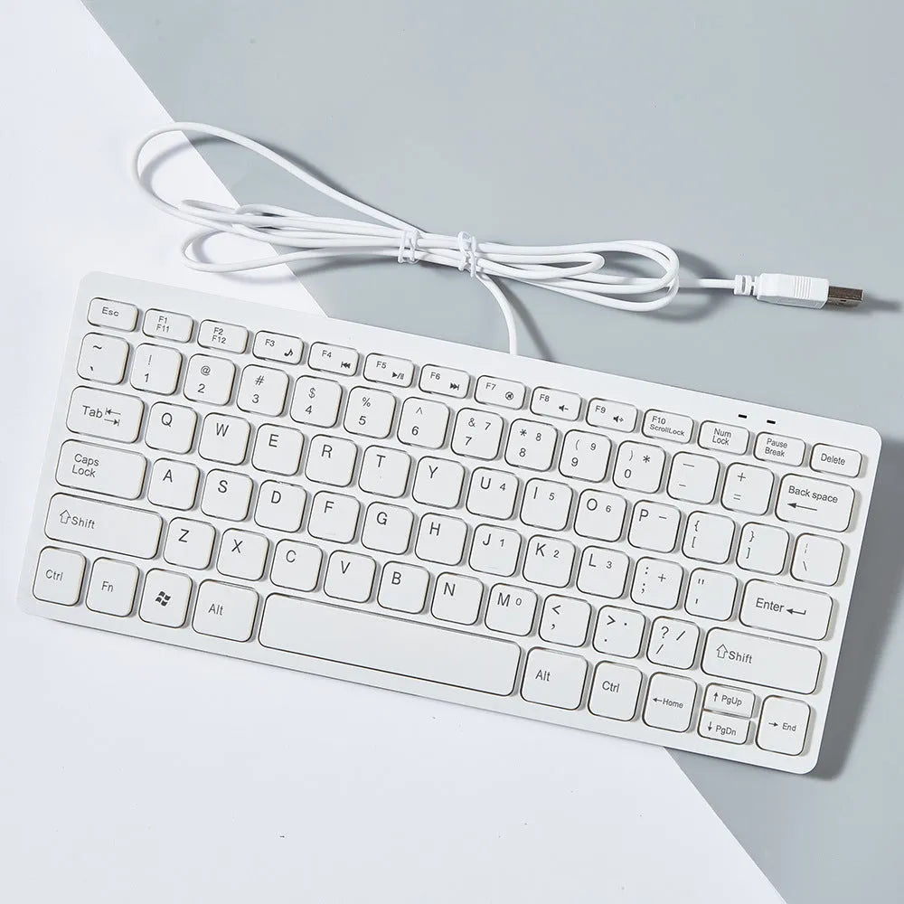 Compact USB wired keyboard in black, white, pink or blue colour with 1.3 metre cable