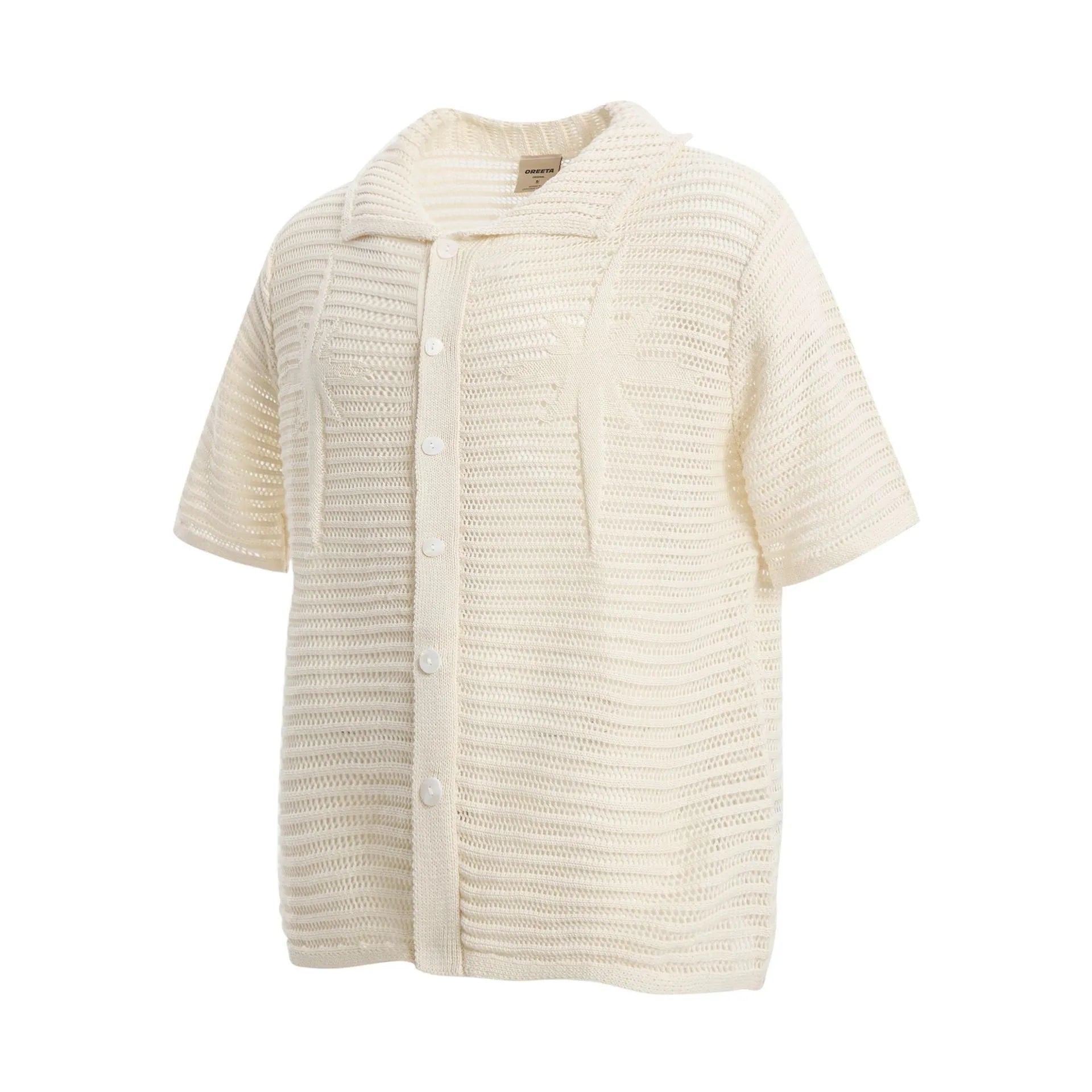 American retro style loose-fit short sleeve cotton shirt in apricot colour on a hanger.