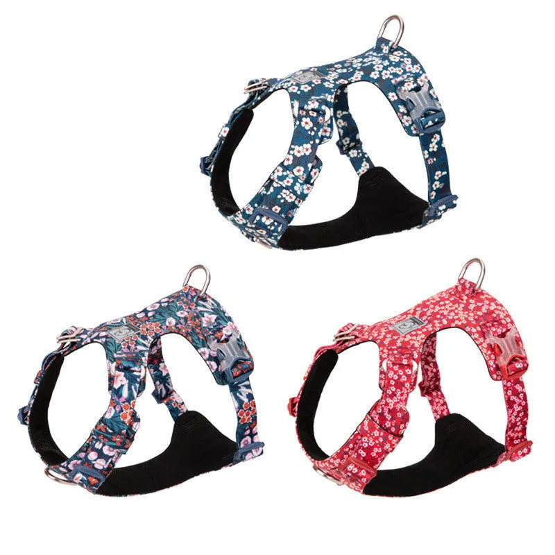 Cotton pet harness with chest strap in floral pattern, showing size adjustment points