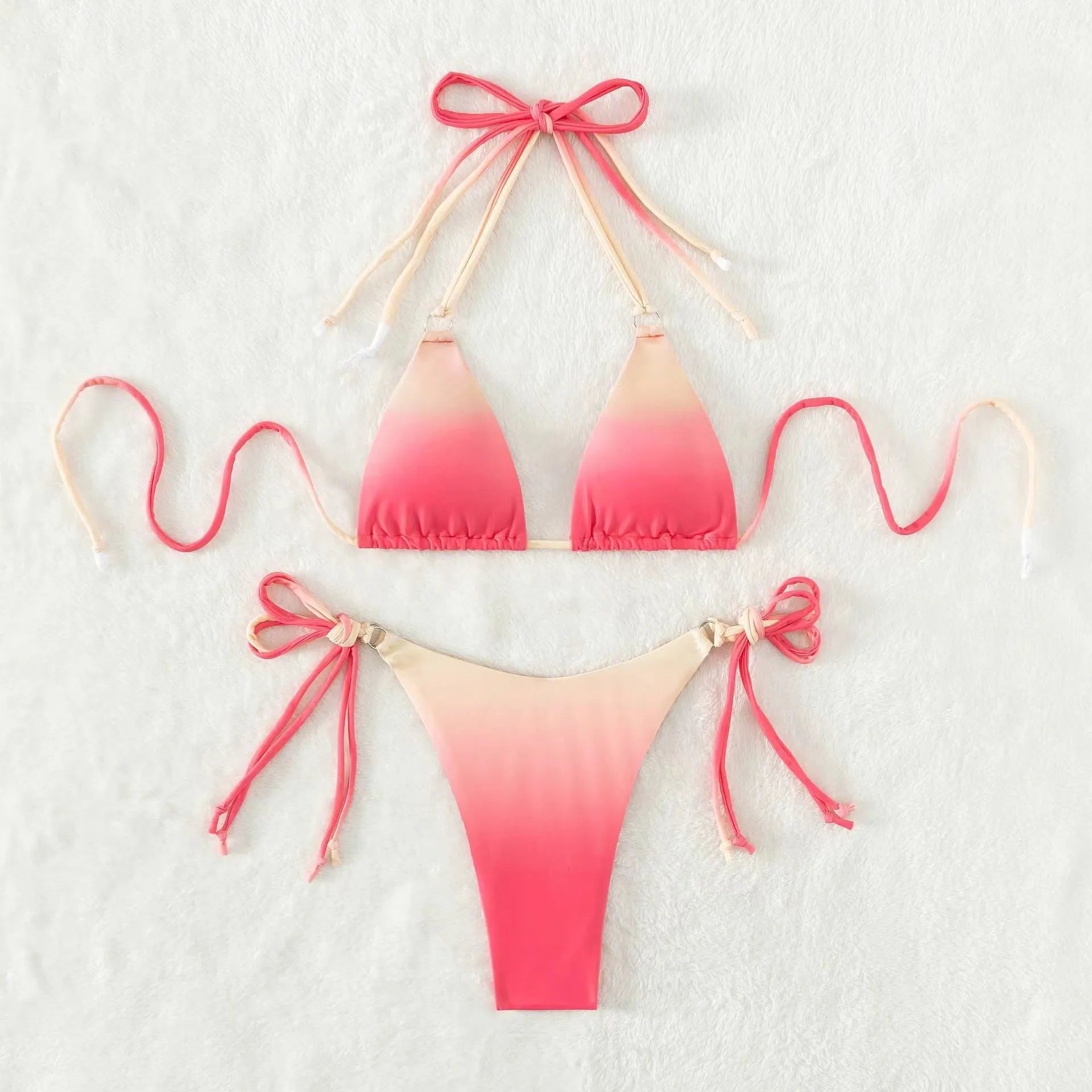 Women's separate bikini swimwear in a gradient colour with a bikini top and briefs bottom.