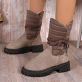 Women's black chunky heel snow boots with lace-up design and fleece lining
