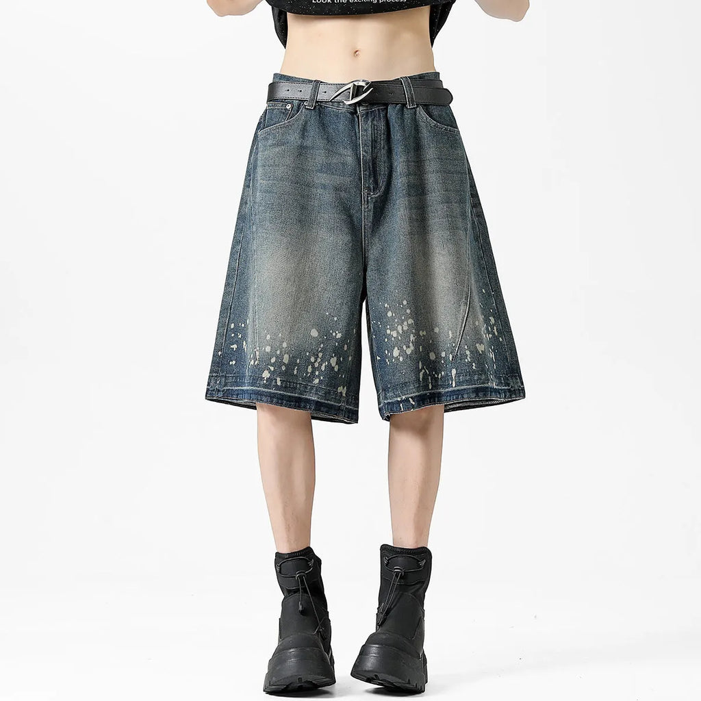 Men's retro blue denim shorts with splash ink pattern and ripped straight-leg design