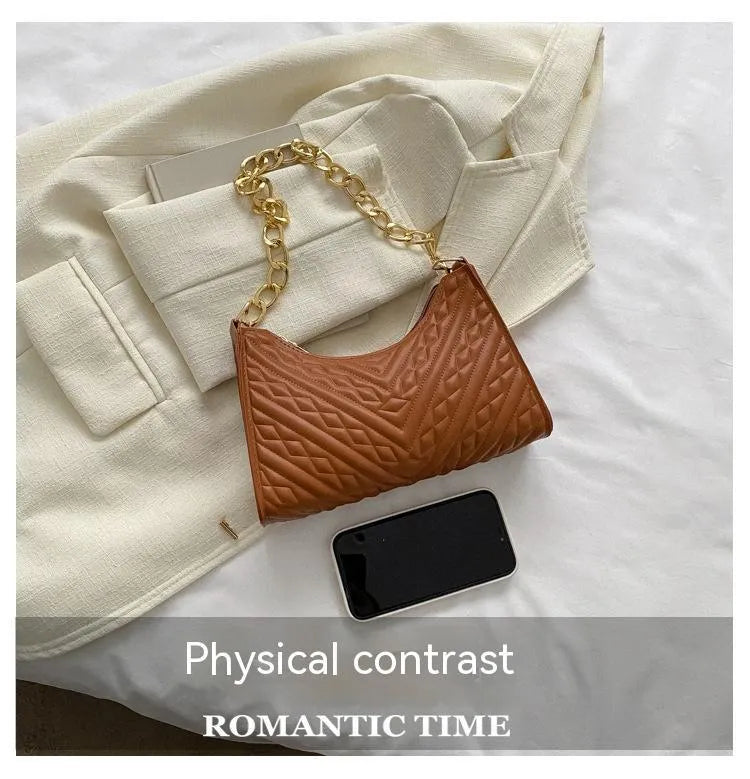 Soft PU leather pleated chain baguette shoulder bag in a vertical square shape, shown in brown colour.