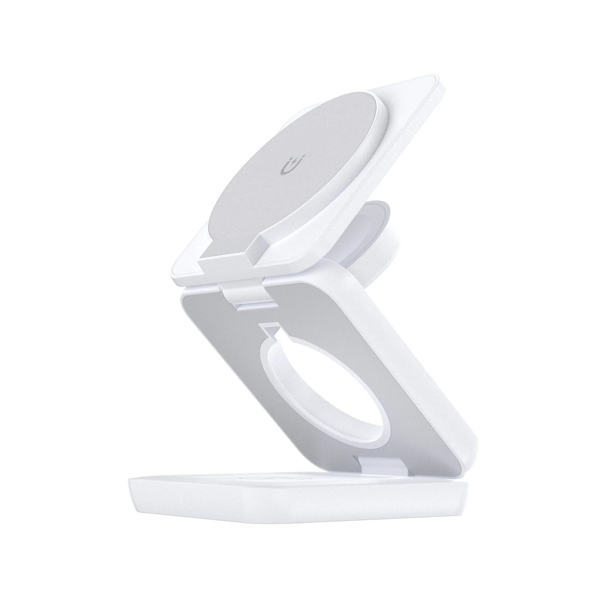 White foldable magnetic wireless charging phone stand on a wooden desk next to a mobile phone.
