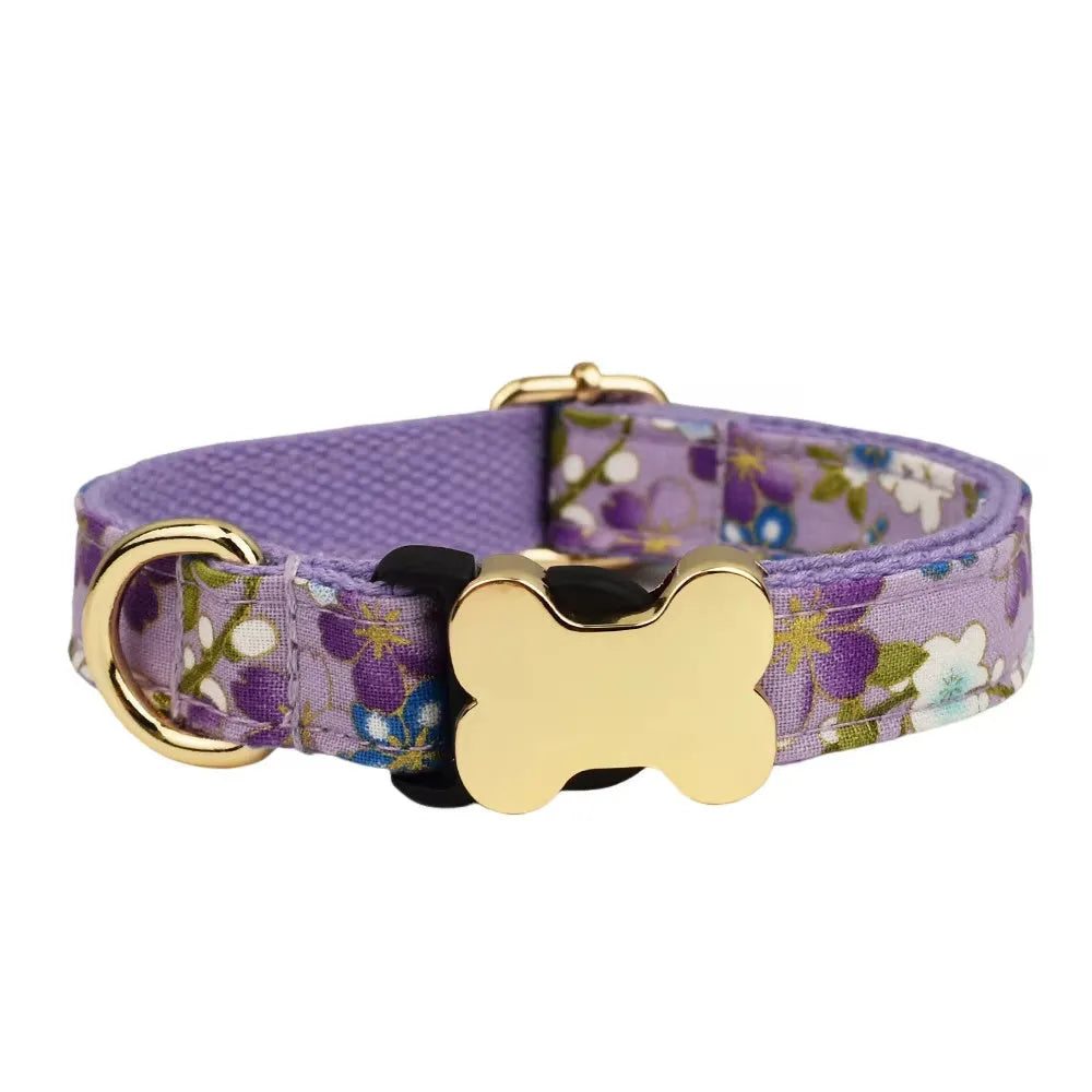 Nylon dog collar with grid print and bone-shaped metal buckle in multiple colour options.