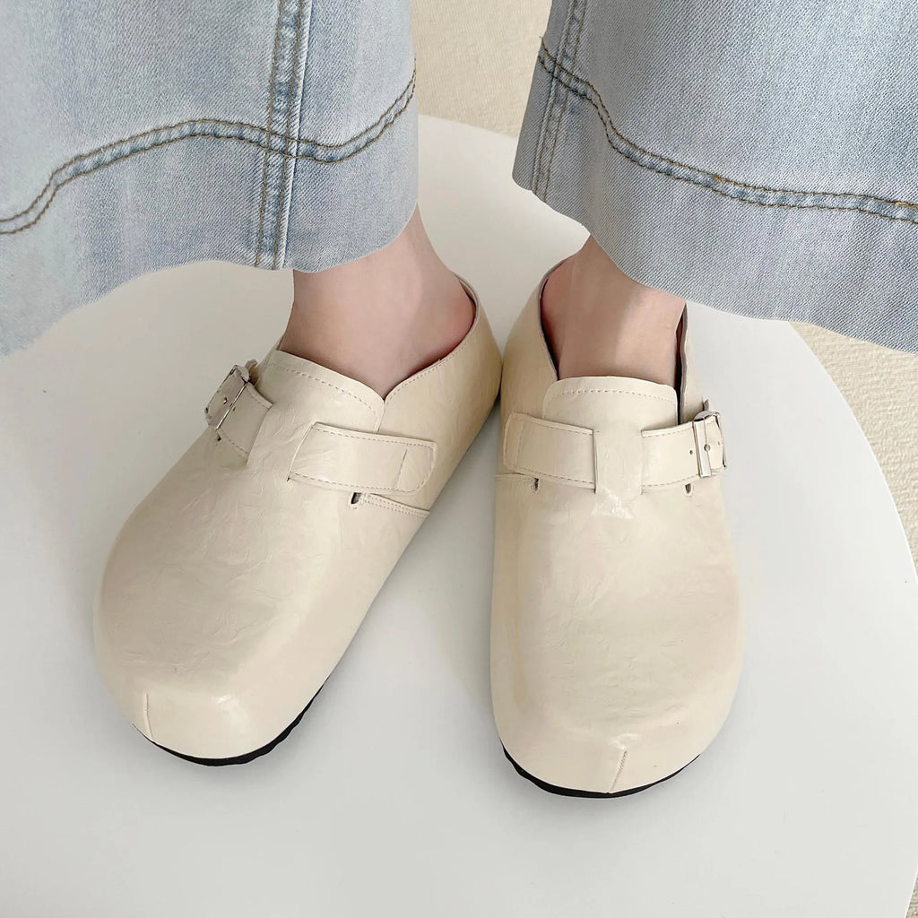 Flat buckle casual sneakers in yellow, round toe, PU upper, on a white background.