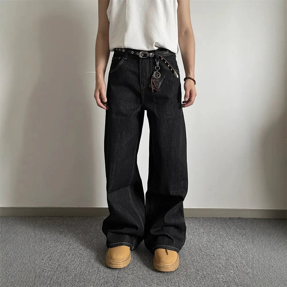 Black retro-style loose wide-leg straight-leg jeans on a hanger.
