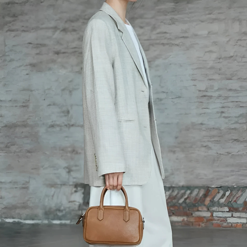 Genuine leather crossbody bag for women in coffee colour with horizontal square shape and metal zip