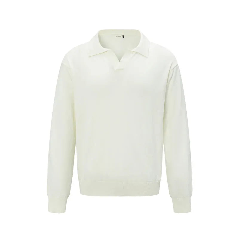 A woman wearing a loose beige acrylic-blend pullover shirt for casual leisure.