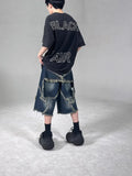 Blue denim shorts with frayed five-pointed star embroidery in loose fit style