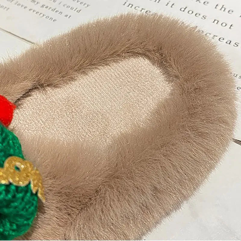 Women's Christmas hat design faux plush slippers with hairy texture and rubber sole.