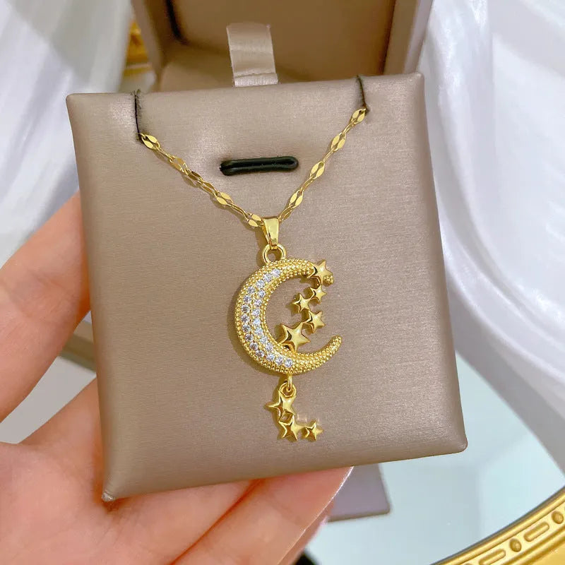 Silver tone necklace with moon-shaped copper pendant on stainless steel chain