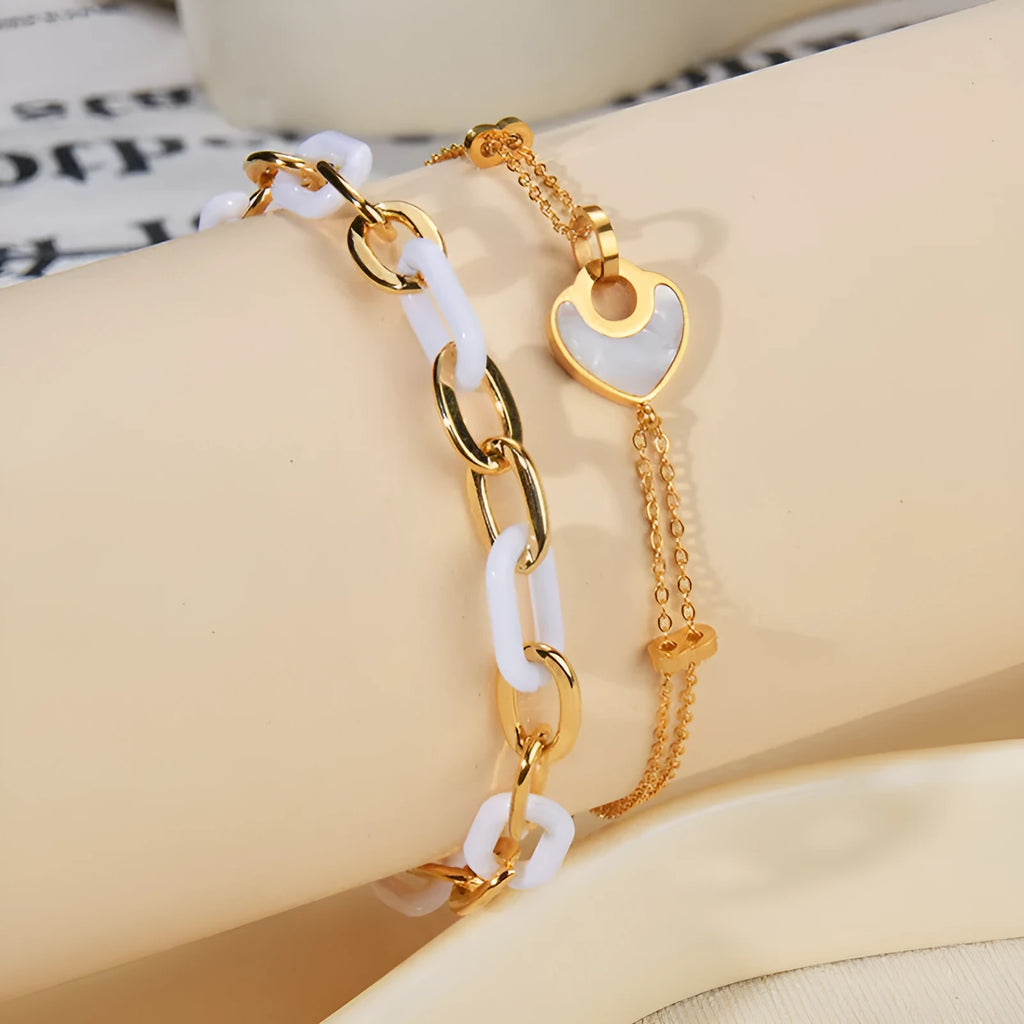 Women's stainless steel bracelet with double-layered resin heart design