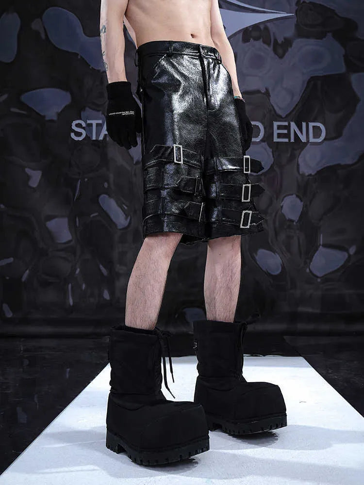 Men's black PU leather shorts with ring detailing, cropped casual design