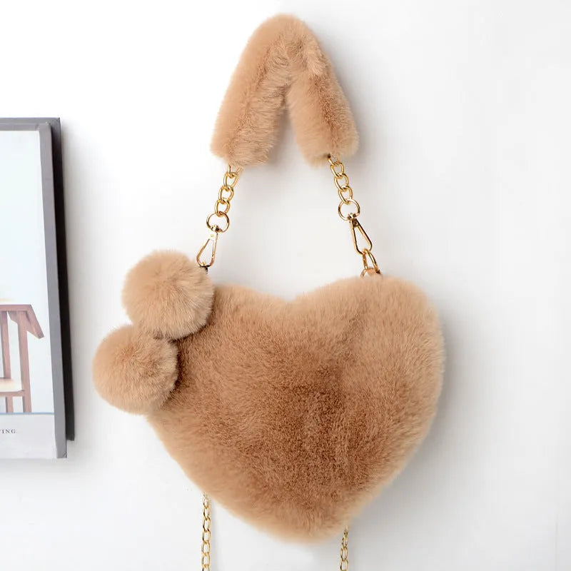 Soft plush heart-shaped women's handbag in medium size with zipper closure