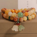 Women's natural jade bracelet with orchid pendant and multi-bead layers