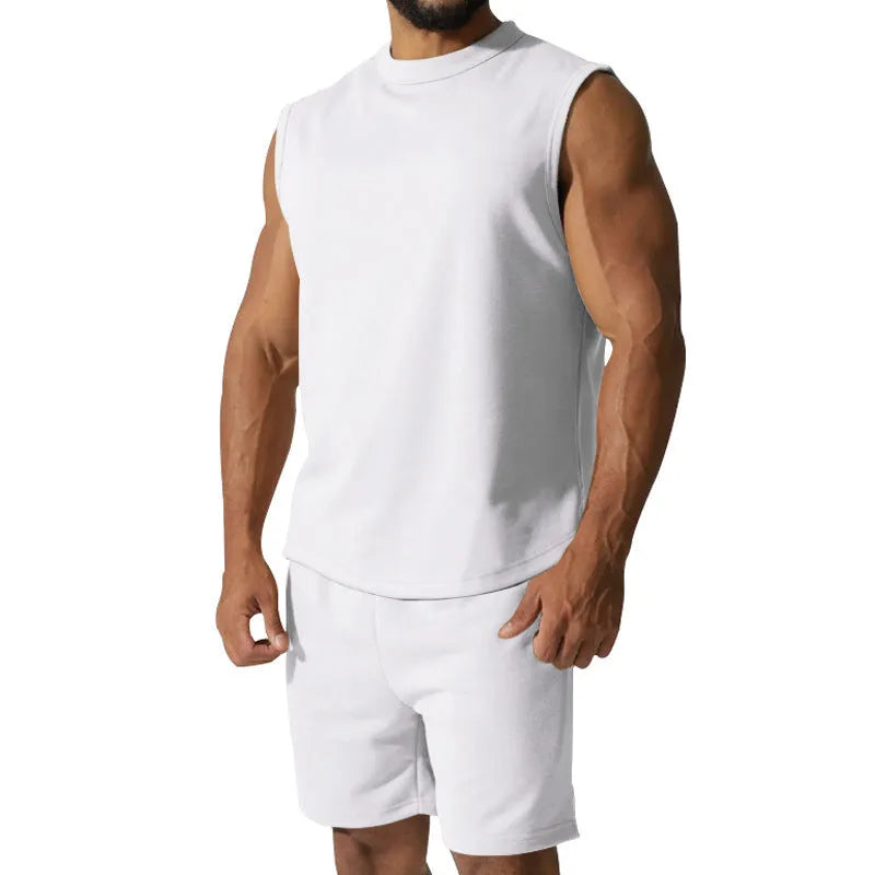 Men's solid colour sleeveless sports top and matching casual shorts set on a hanger