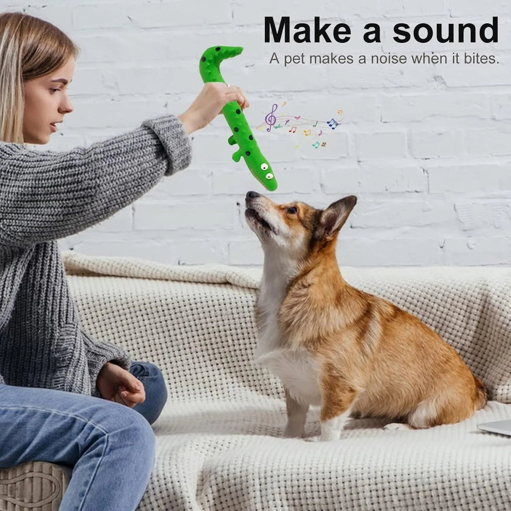 Green cartoon lizard-shaped dog chew toy with squeaker for aggressive chewers
