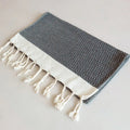 Square cotton yarn-dyed napkin with tassel edges in Nordic style, available in multiple colours