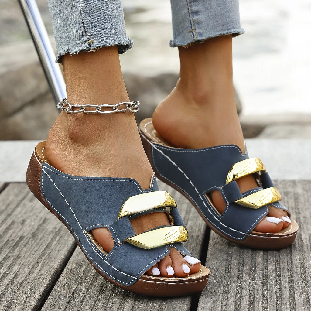 Roman style platform sandals in white, black, khaki, and sea blue on a solid background