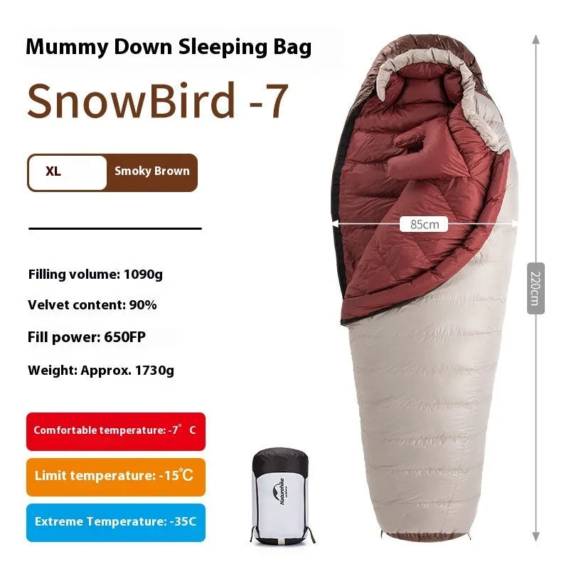 Goose down mummy style sleeping bag for adults with a storage bag.