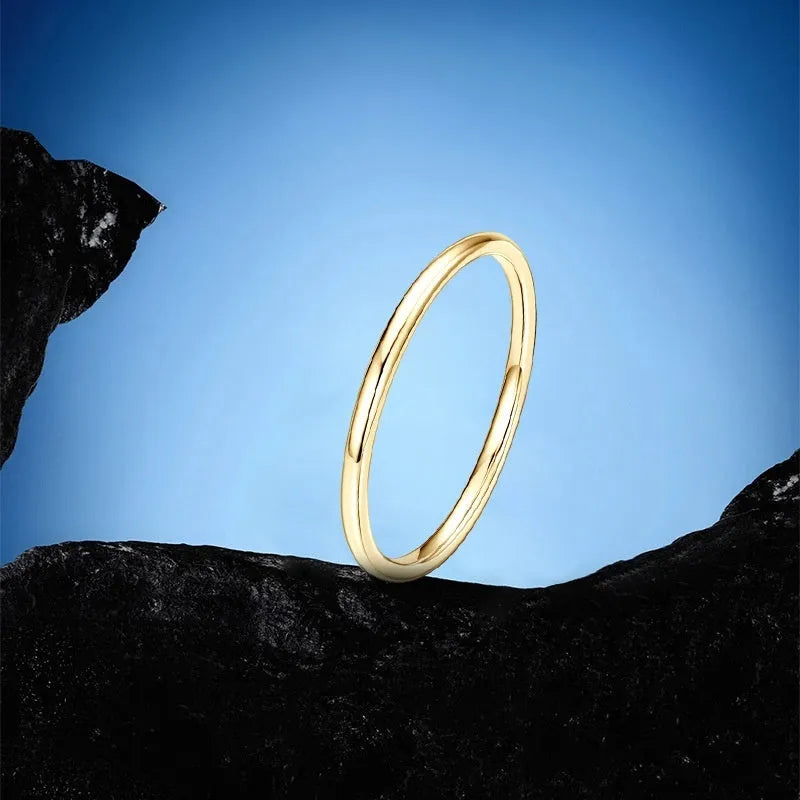 Minimalist geometric bracelet ring in sterling silver, gold, or platinum on a plain background.