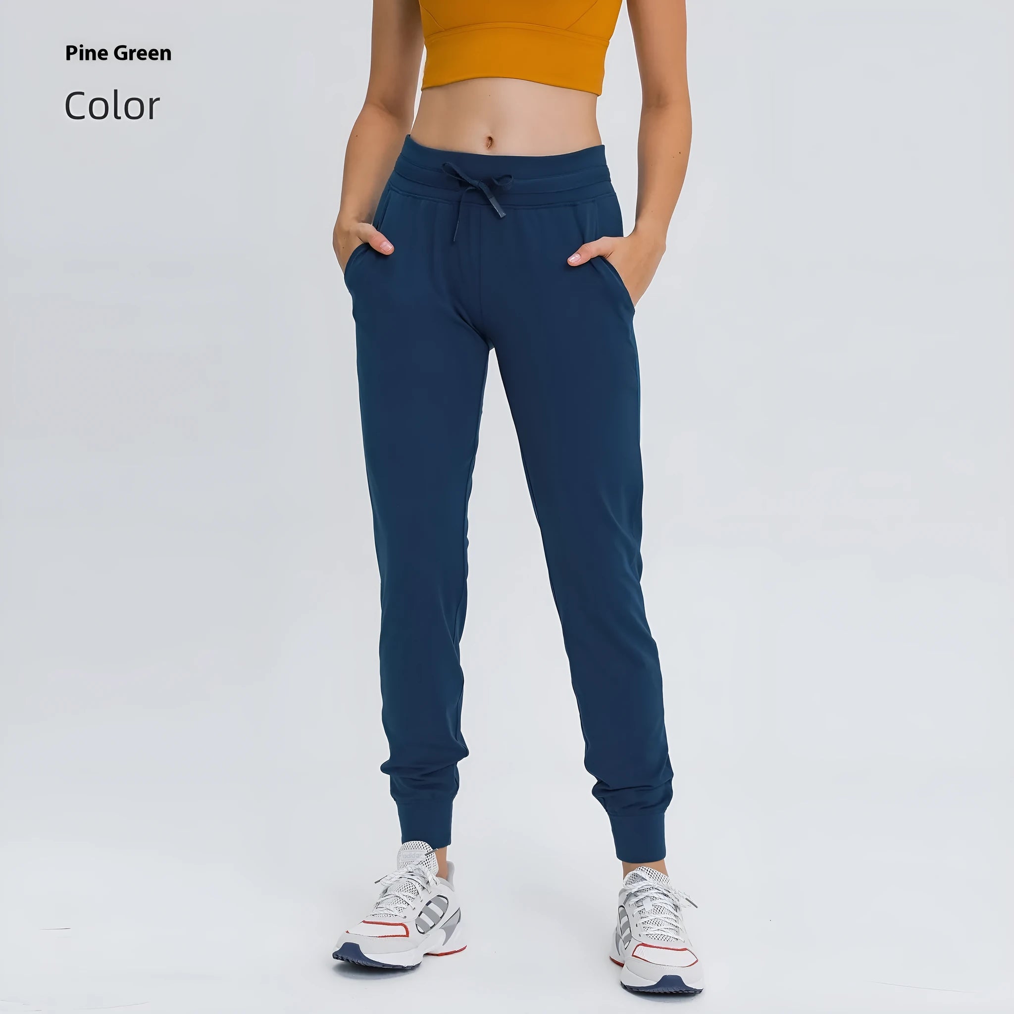 Women's high waist yoga pants with drawstring waistband in quick-drying cotton blend fabric, multiple colour options